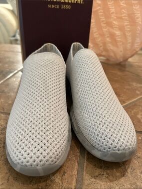 Never worn Johnston & Murphy gray knit slip on, size 8 and a half.  Brand new.